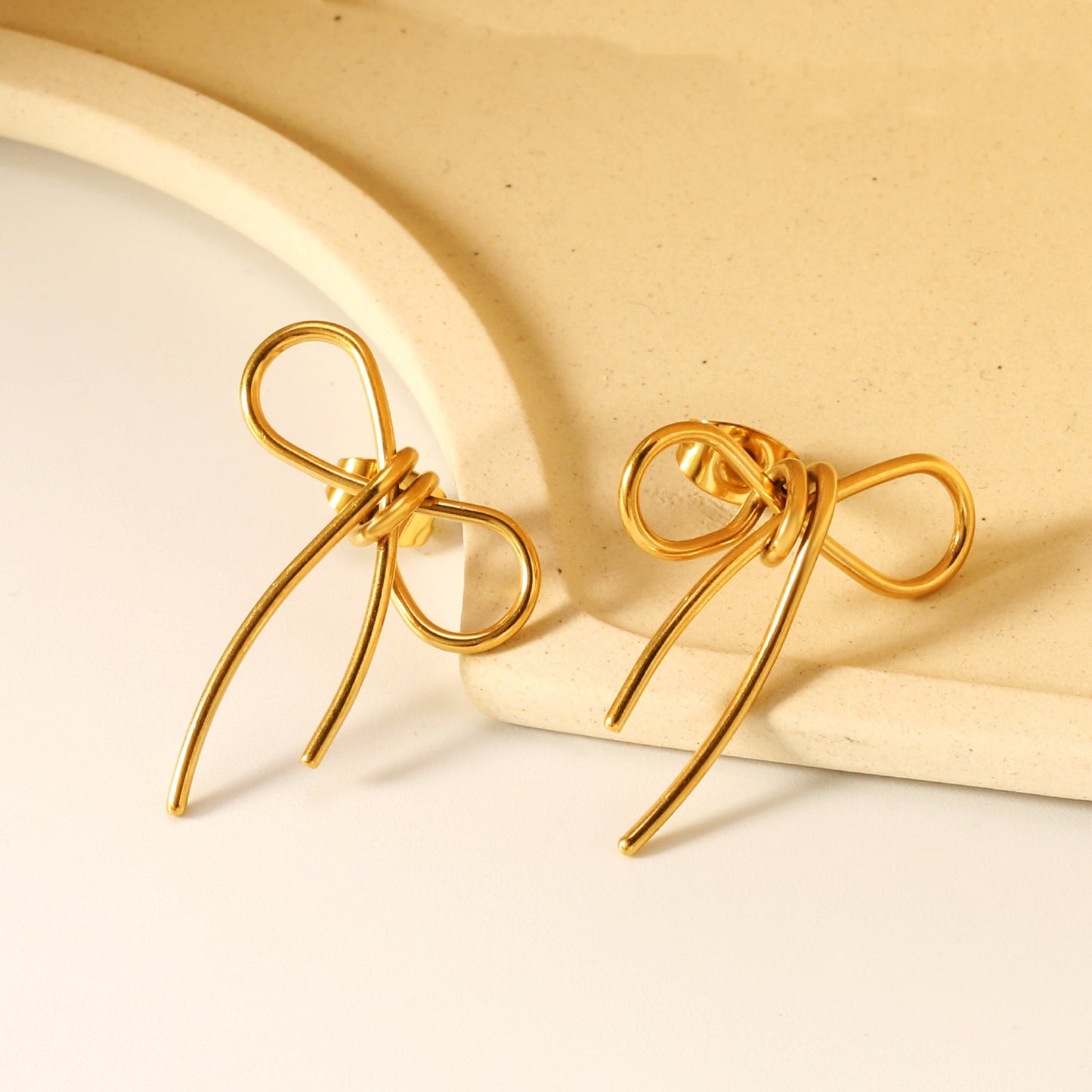 21*26mm bow earrings gold color