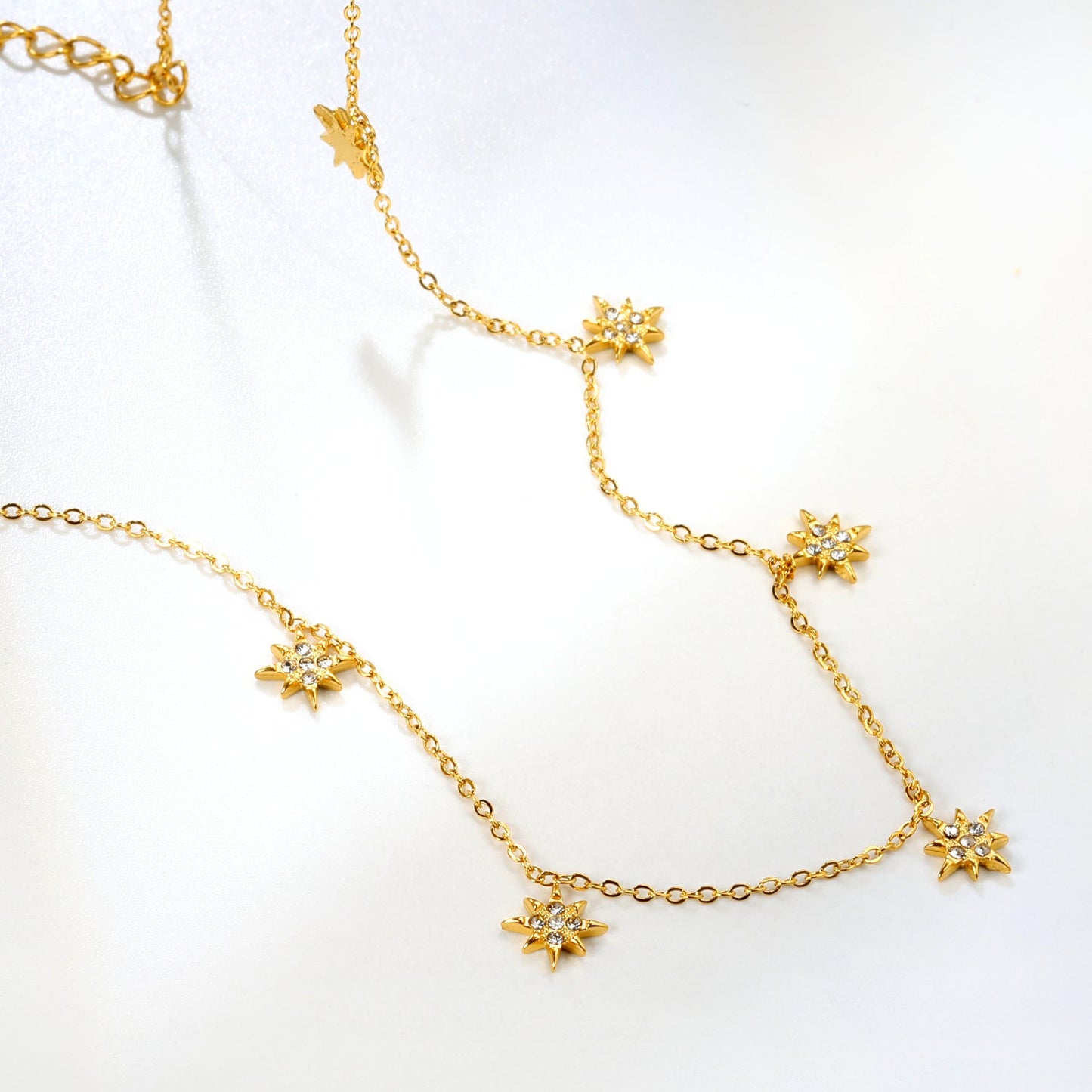 7.7 x 8.5 mm eight-pointed star accessory (5 white zirconia stones) 0.3 cross chain 40+5 cm + 6 mm round pendant necklace gold