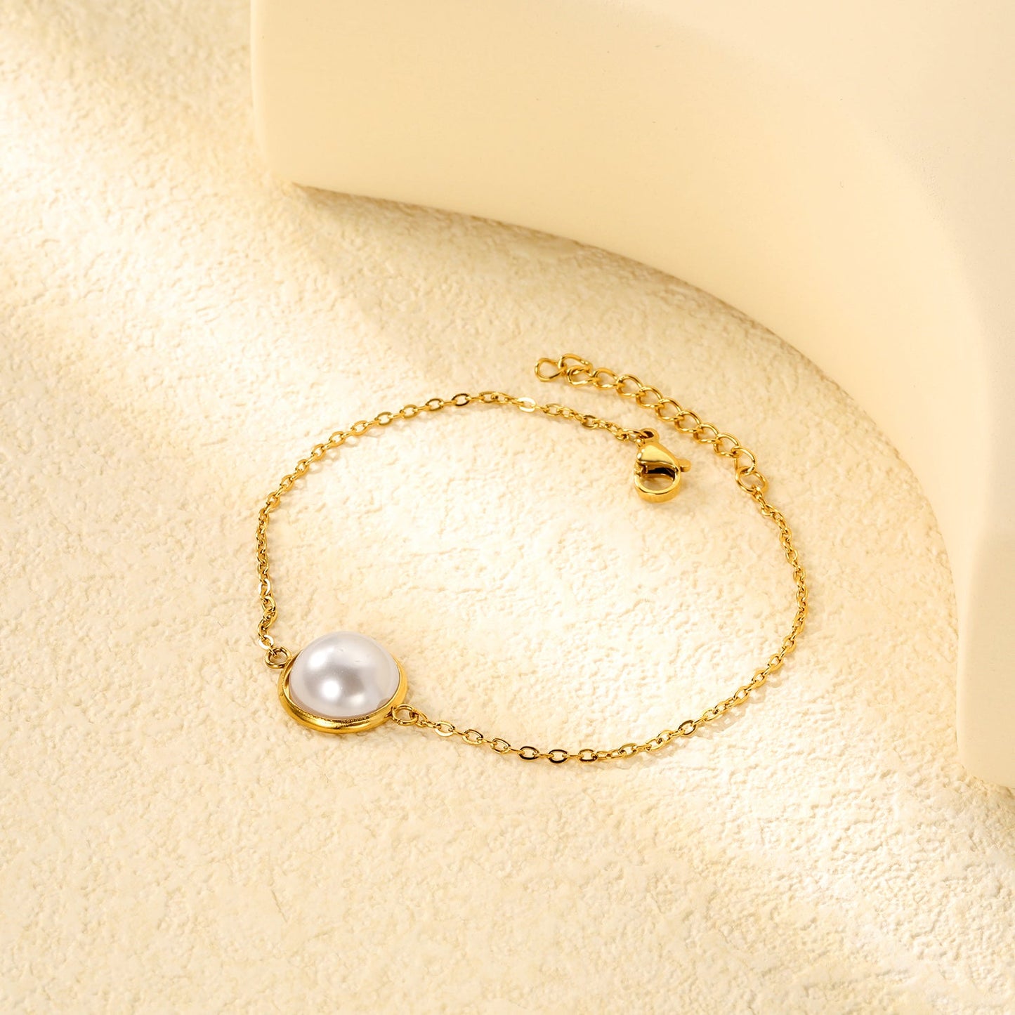 12-14mm round with half white pearl 16-18+3cm bracelet steel/gold color