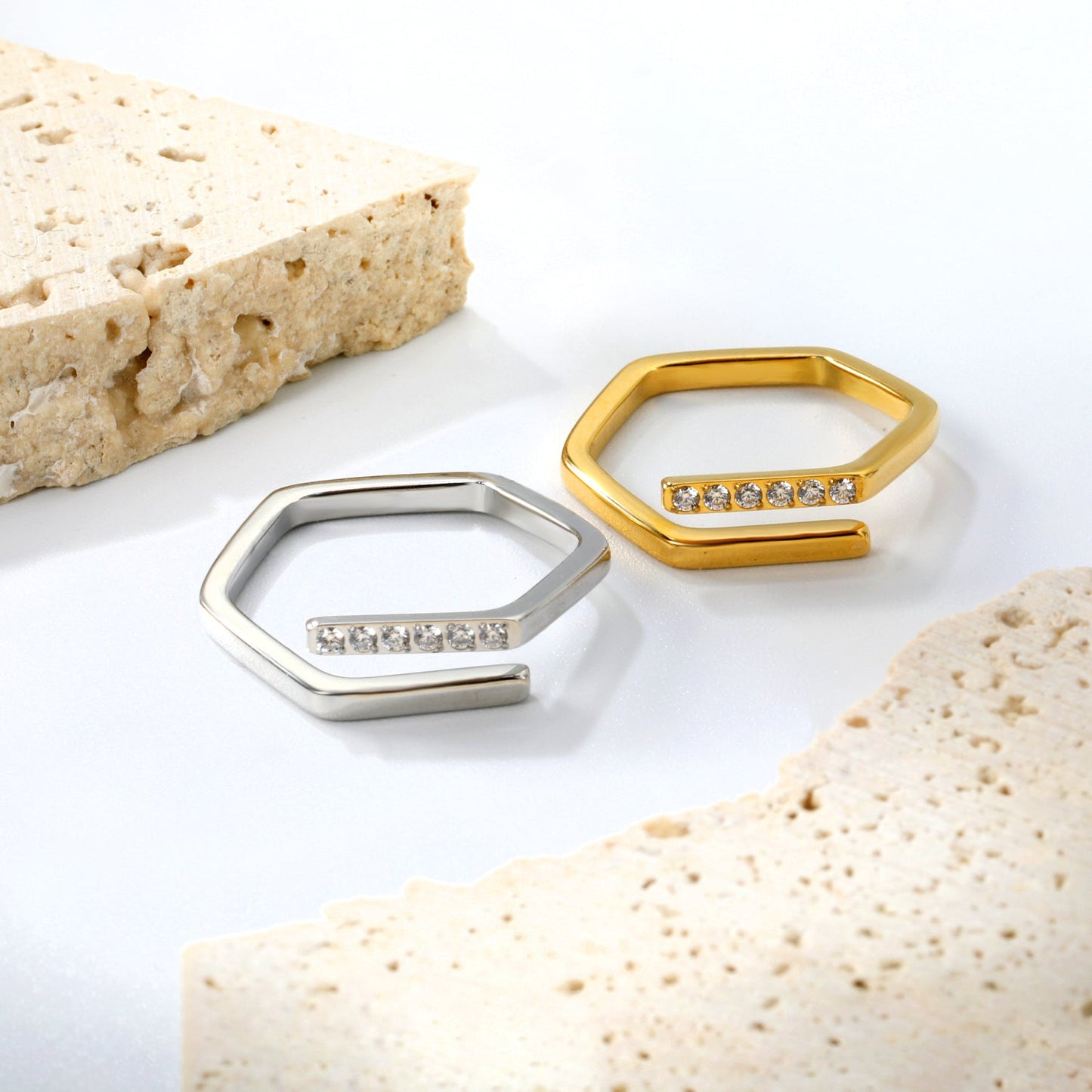 Hexagonal ring with white zirconia head, CNC set, height 5.7 mm, steel color / gold