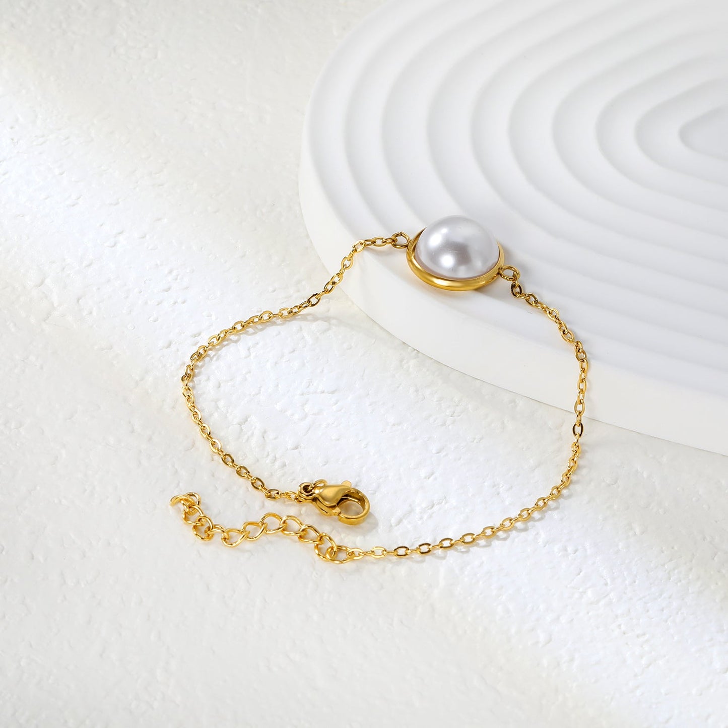 12-14mm round with half white pearl 16-18+3cm bracelet steel/gold color
