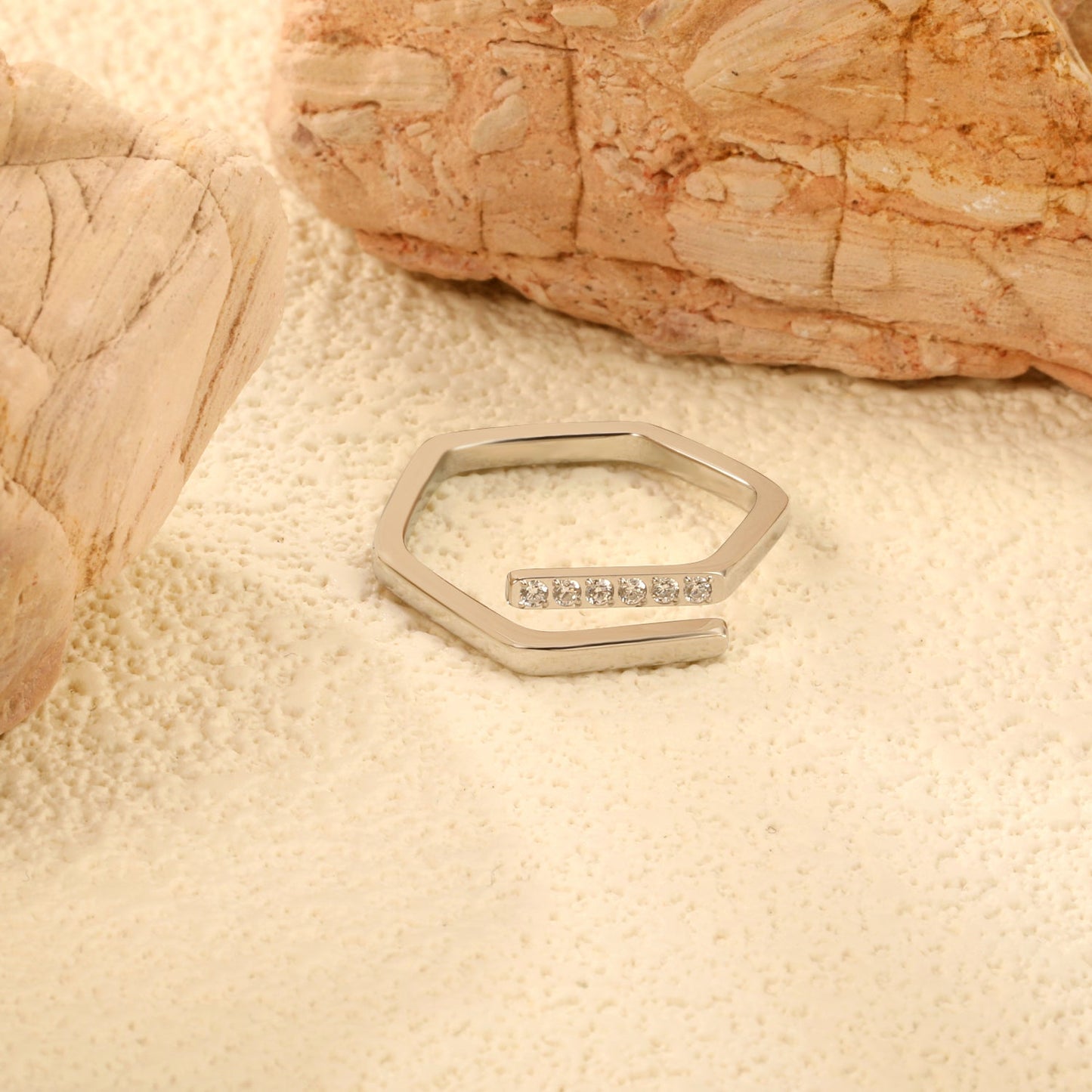 Hexagonal ring with white zirconia head, CNC set, height 5.7 mm, steel color / gold