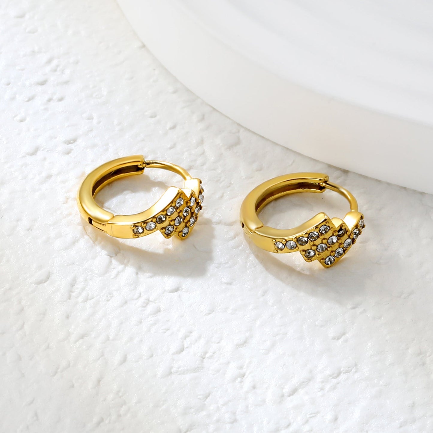 6.4 x 10.9mm diagonal rectangular white zirconia stud earrings with 2.2mm post and 10mm inner diameter, gold-plated