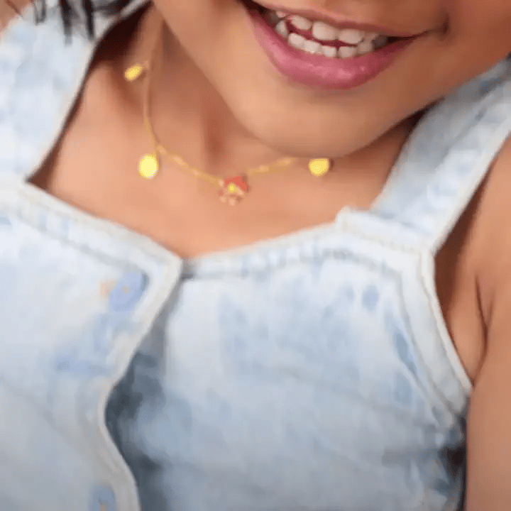 Child model wearing a custom butterfly jewelry collection