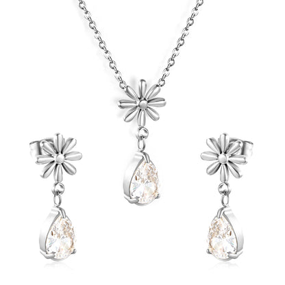 Flower + drop white diamond set Steel / Gold Earrings: 8.3mm flower + 6.2*10mm drop white diamond Pendant: 8.9mm flower + 6.2*10mm drop white diamond 0.3 Cross chain 42+5cm+6mm round plate