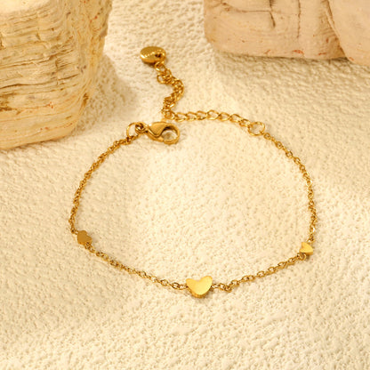 5.8*6.5mm 1 crooked heart + 3.7*2.8mm 2 heart accessories 0.3 cross chain 16+5cm+6mm round plaque bracelet gold color