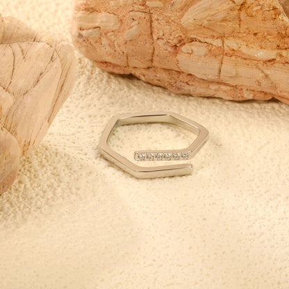 Hexagonal ring with white zirconia head, CNC set, height 5.7 mm, steel color / gold