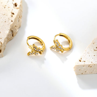 10.3 x 8.8mm butterfly-shaped white zirconia earring with a 2.2mm earring post and a 10mm inner diameter, gold-colored