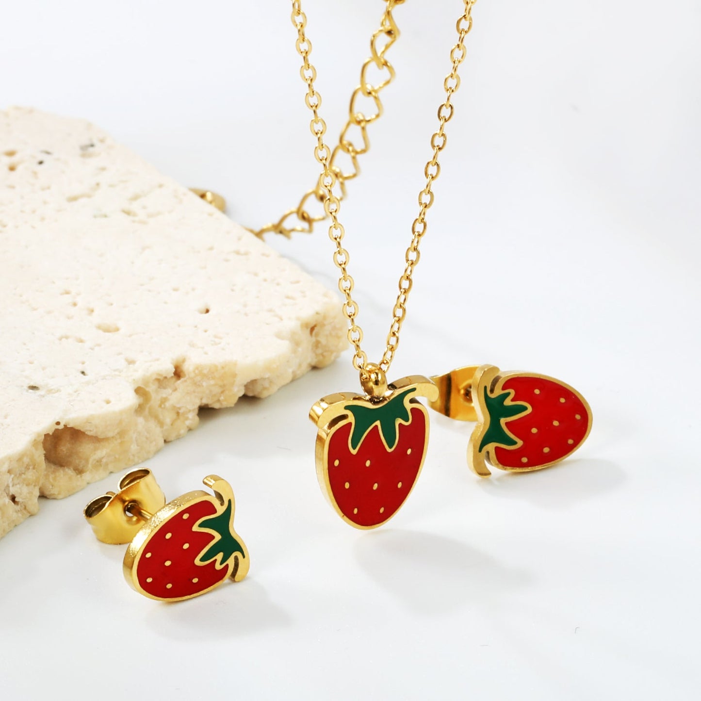 ???Strawberry with red oil drip accessories Set Steel color/golden 0.3 cross 40+5+6mm round plate Pendant: 10.7*13.5mm Earrings: 9*10mm
