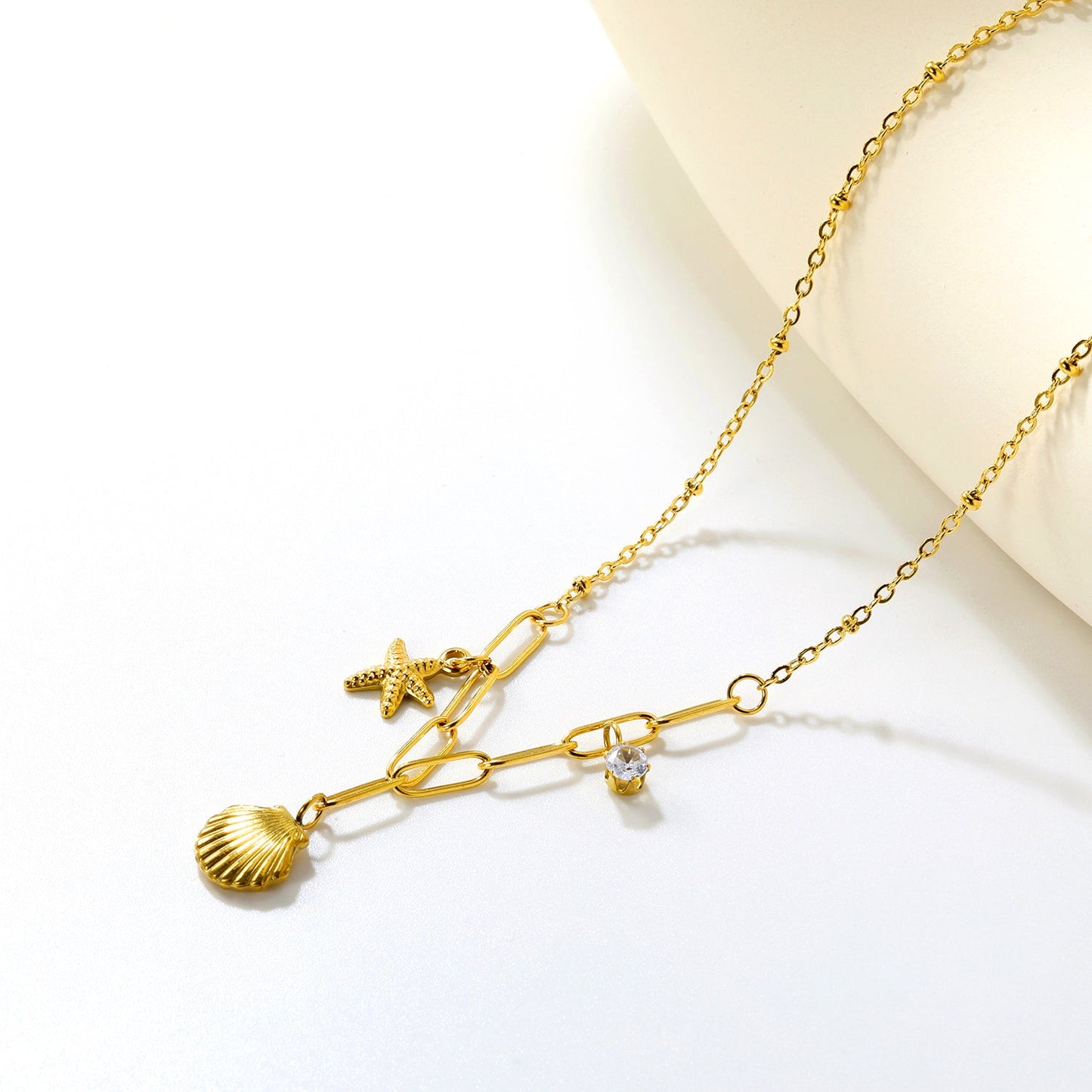 10.2*10.7mm shell+9*12.7mm starfish+4.2mm cylindrical white diamonds 42+5cm+10*3cm necklace steel/golden