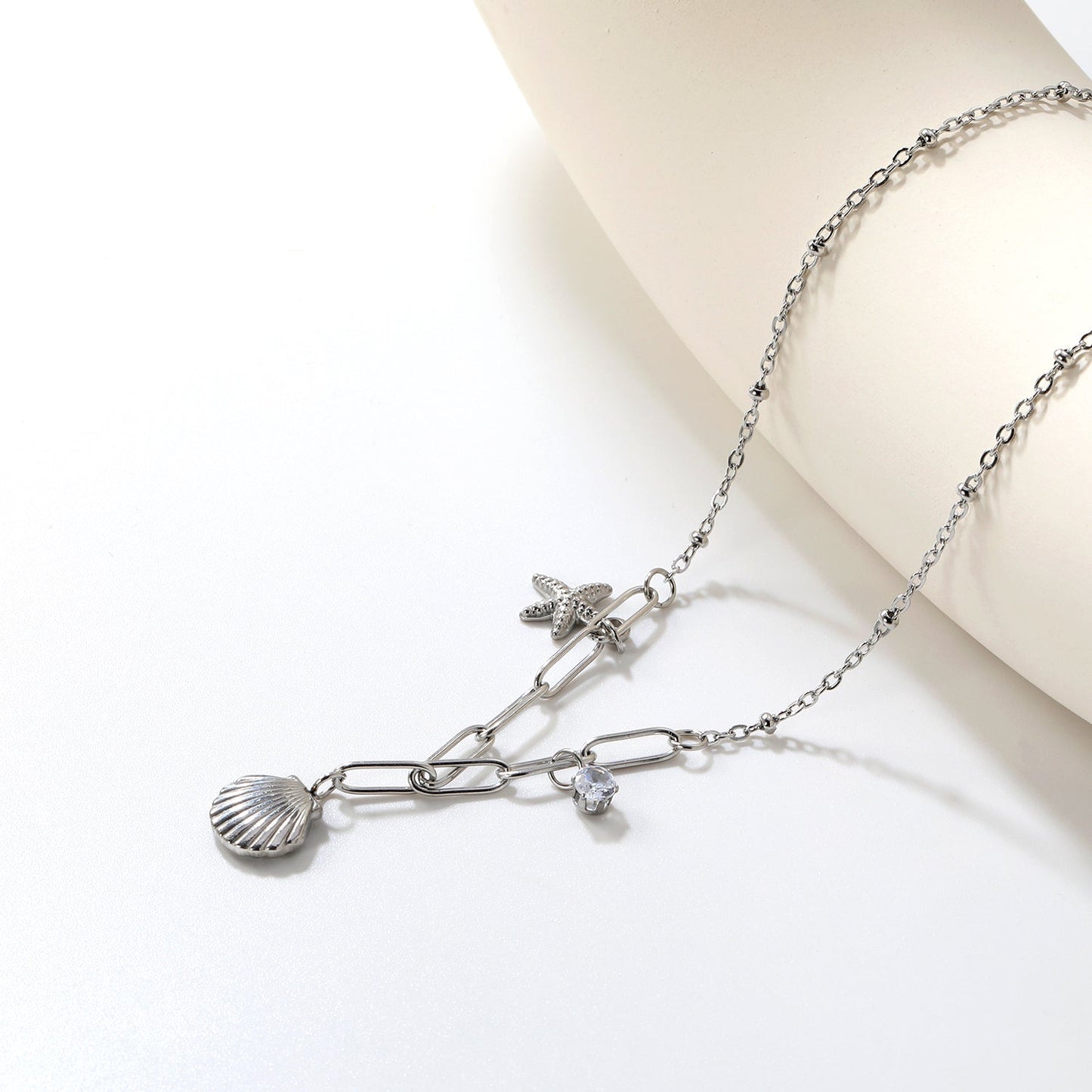 10.2*10.7mm shell+9*12.7mm starfish+4.2mm cylindrical white diamonds 42+5cm+10*3cm necklace steel/golden